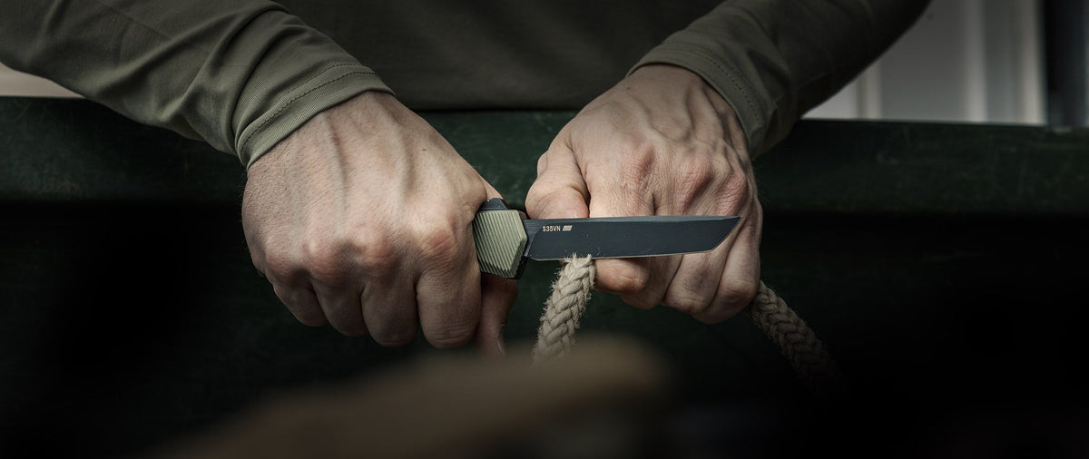 A5 Spry automatic OTF knife on a dark background
