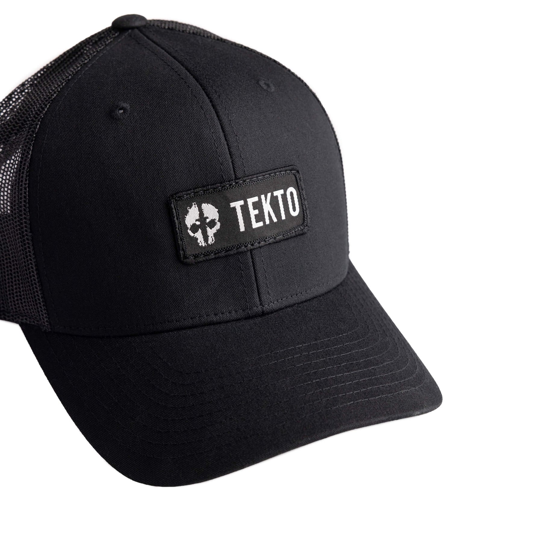 tekto black snapback with embroidered tekto patch front view