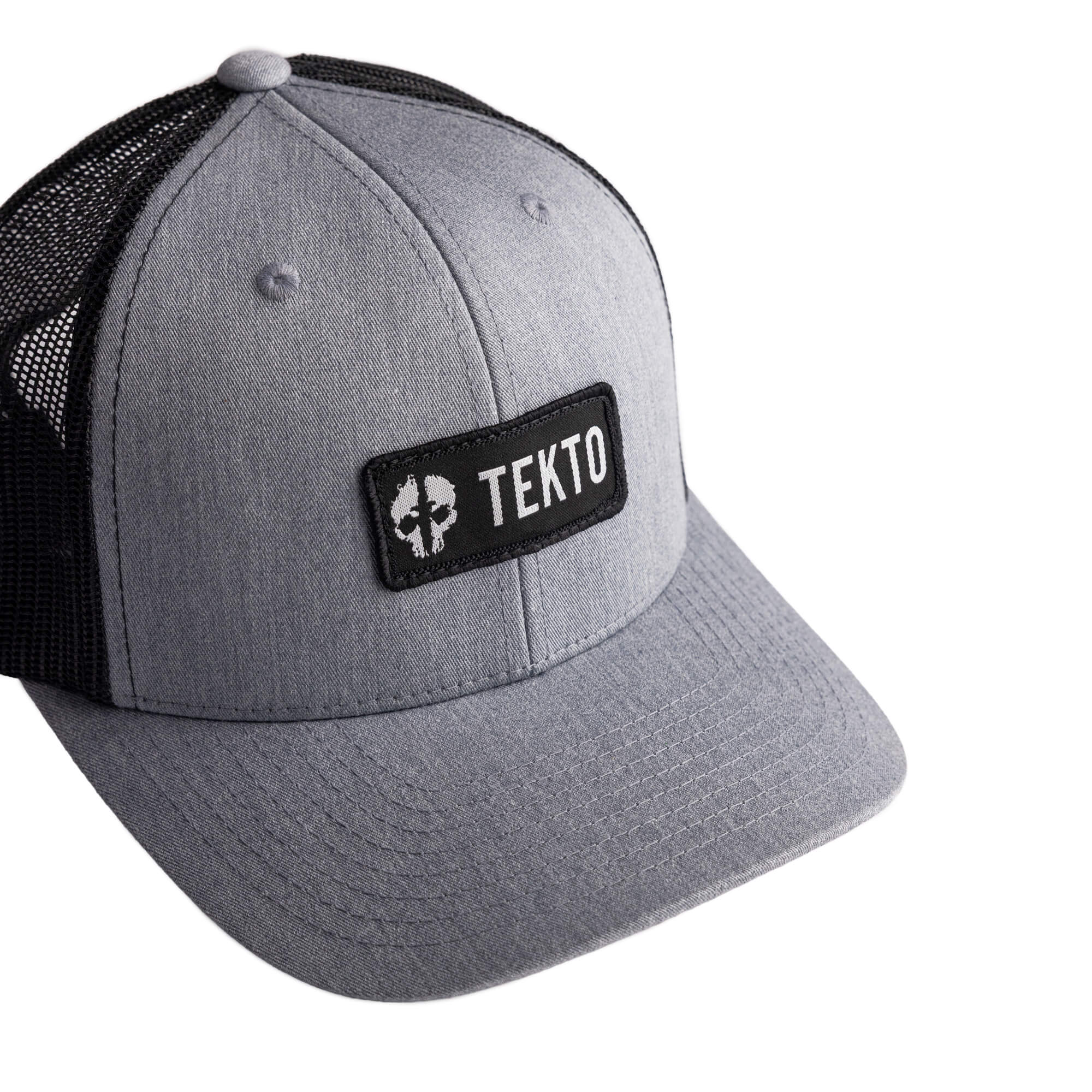 tekto gray snapback with embroidered tekto patch front view