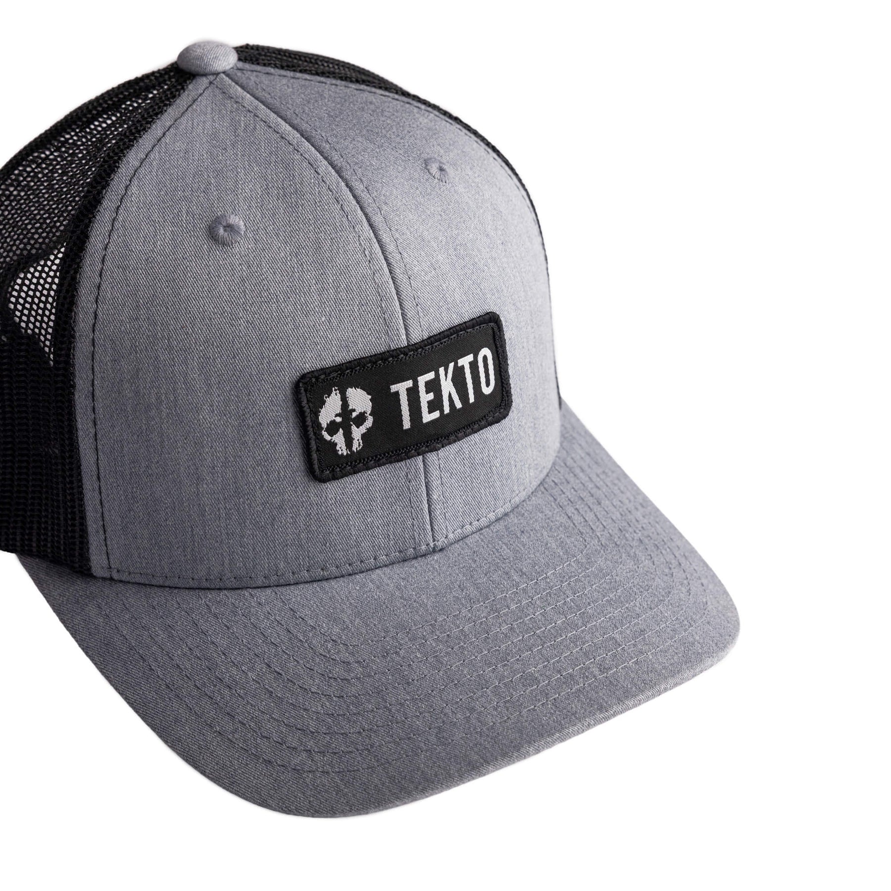 tekto gray snapback with embroidered tekto patch front view